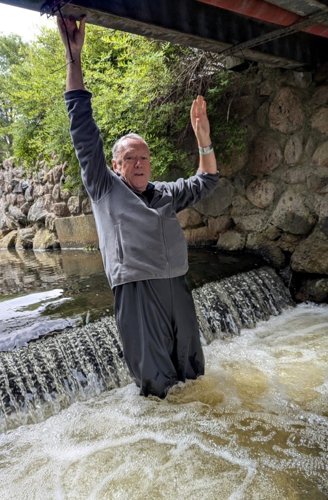 James negotiates a small waterfall in pretty Kuldiuga (Pic: Krista Jansone)