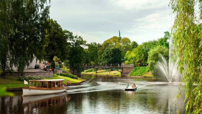 Boats pass along Riga's lovely canal (Pic: Girts Ragelis)