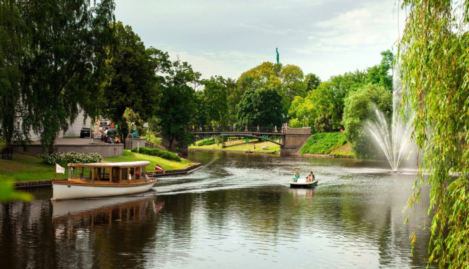 Boats pass along Riga's lovely canal (Pic: Girts Ragelis)